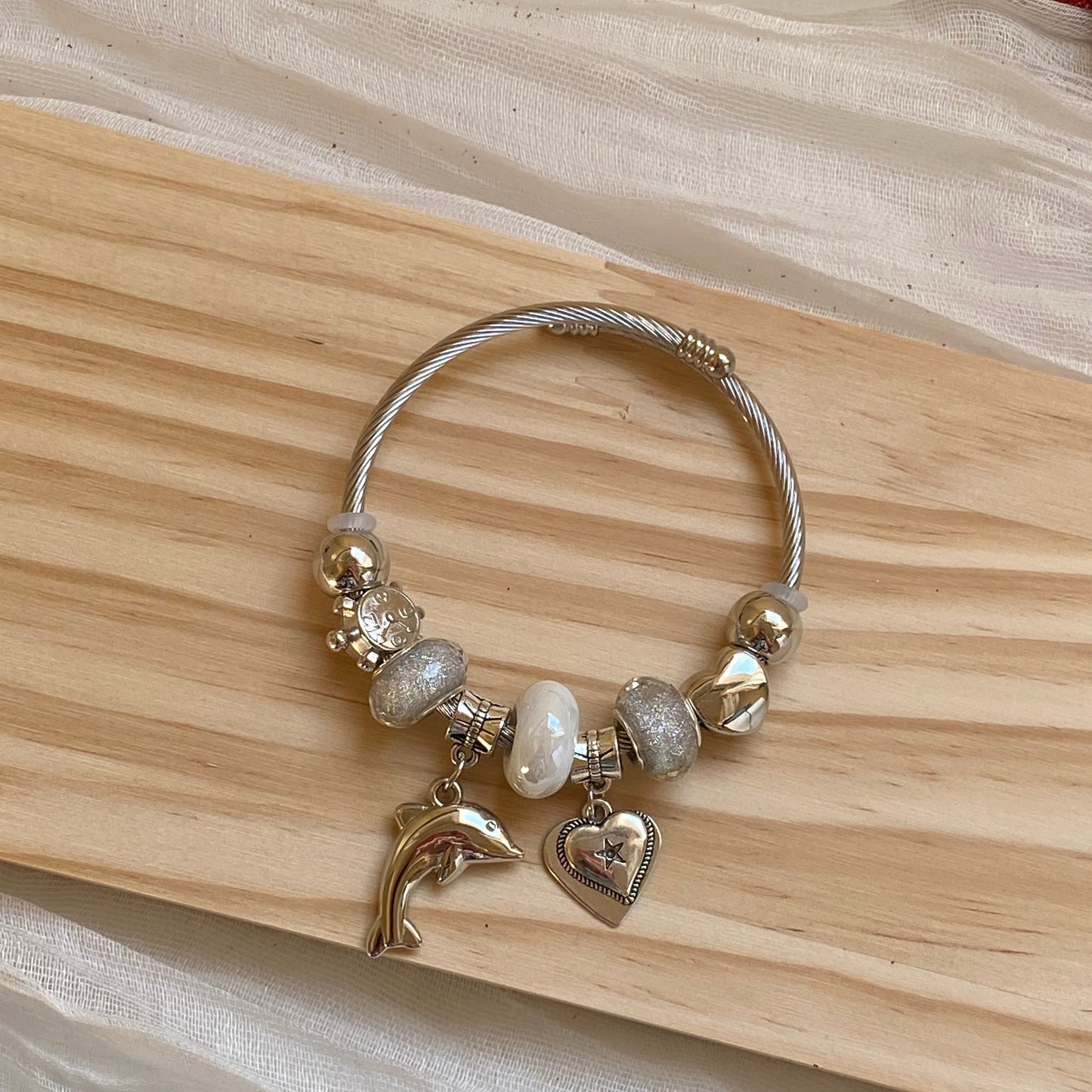 Dolphin bangle
