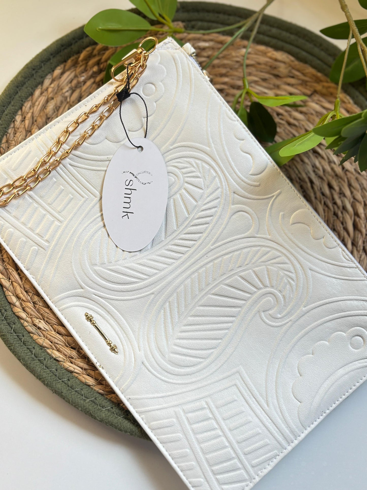 Arabesque clutch