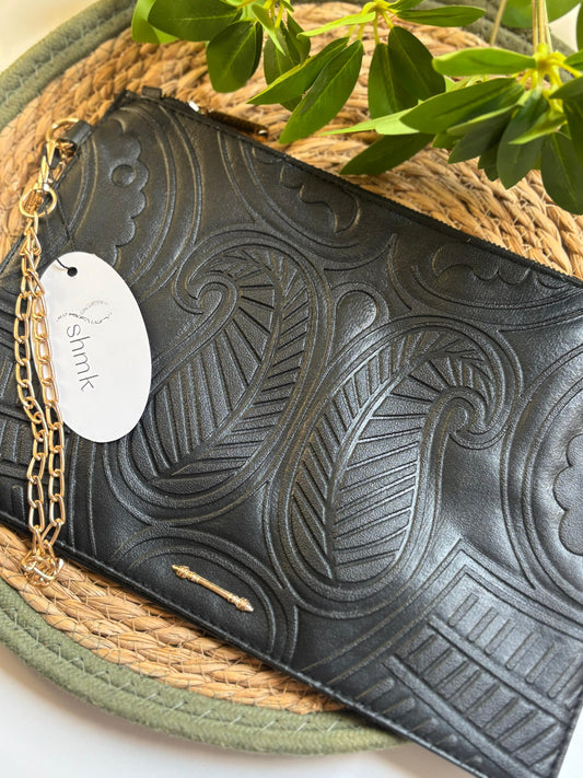 Arabesque clutch