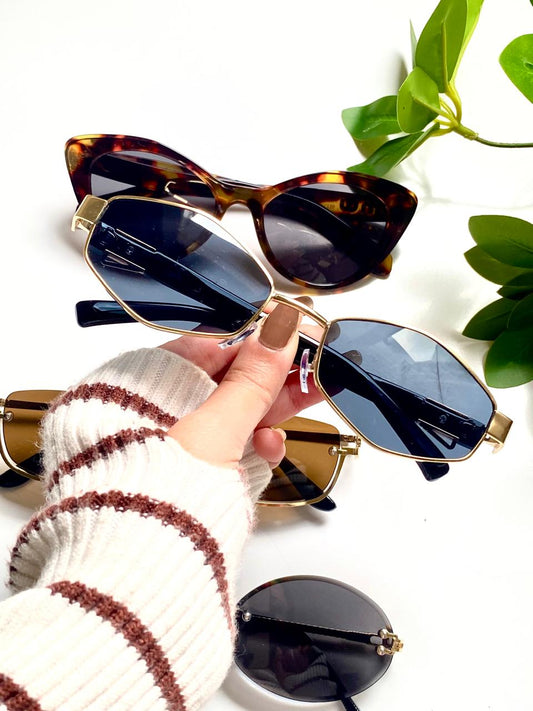 asymmetrical frame sunglasses with chain